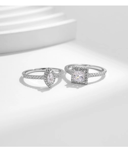 Detailed view of S925 sterling silver rings with marquise and princess cut zircons
