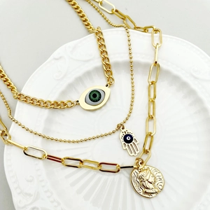 Three-layer gold-plated stainless steel necklace with Hamsa hand and Evil Eye charms