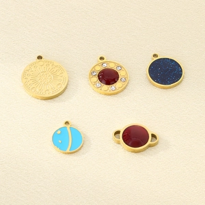 Detailed set of five celestial gold pendants with star patterns and inlaid rhinestones