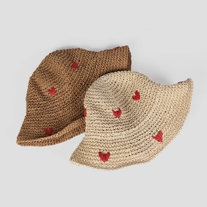 Foldable women's sun hat with heart crochet pattern in beige and brown colors