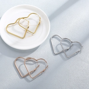 Fashionable heart-shaped stainless steel hoop earrings with twisted metal texture in three colors