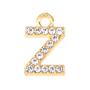 Macro shot of gold-plated alloy letter Z pendant with sparkling rhinestones for DIY jewelry