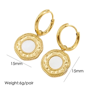 Detail of 14K gold titanium earrings featuring 15mm white shell inlay and wave border