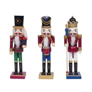 Three traditional wooden 25cm nutcracker figures including king and drummer for Christmas decor