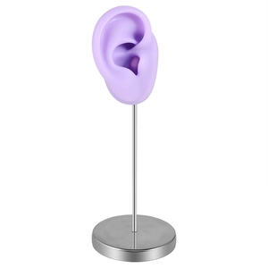 Lavender silicone ear model with silver metal stand for jewelry display and piercing study