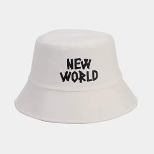 Close-up of white cotton bucket hat featuring black NEW WORLD embroidered lettering