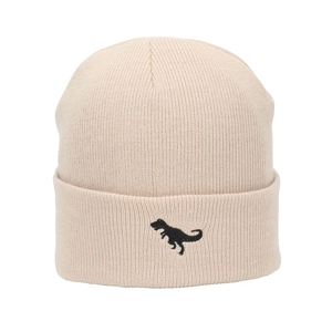 Detail shot of beige knitted beanie featuring a small black dinosaur embroidery and ribbed texture