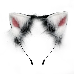 Plush black and white cat ear headband with pink inner faux fur on white background