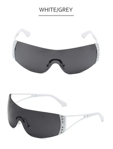 Detail view of Y2K rimless sunglasses with star decoration and sparkling rhinestones