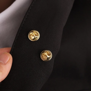 Pentagram star pearl brooch shown with secure golden butterfly clutch pin backs