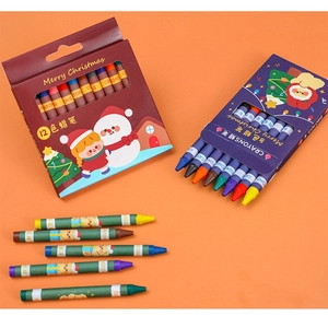 Detailed view of colorful 12-pack Christmas crayons with Santa and snowman illustrations