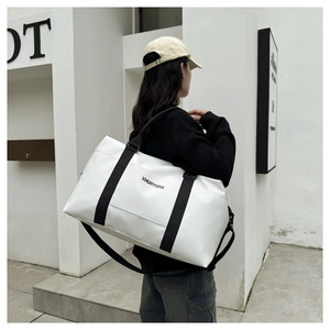 White large capacity sports bag with XHUAYUNX logo and black adjustable strap