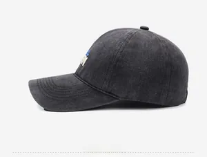 Side view of dark grey washed cotton baseball cap with premium texture and embroidery