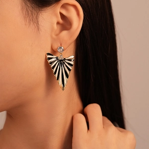 Art Deco striped triangle earrings with black and white enamel and sparkling zircon accents