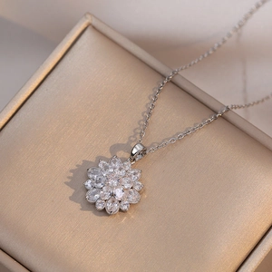 Elegant silver snowflake necklace with cubic zirconia pendant on a delicate chain