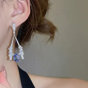 Elegant drop earrings with square blue gemstone and cubic zirconia in vintage silver style