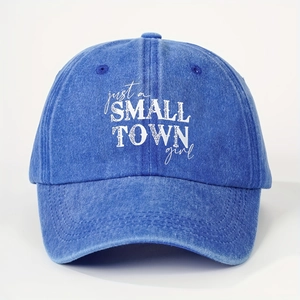 Detail of SMALL TOWN girl text embroidery on washed denim blue cotton baseball cap