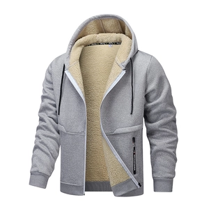 Close-up of men's gray jacket showing thick faux lamb wool lining and zipper detail
