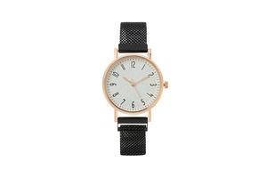 Detailed view of white textured dial with rose gold Arabic numerals and black mesh band