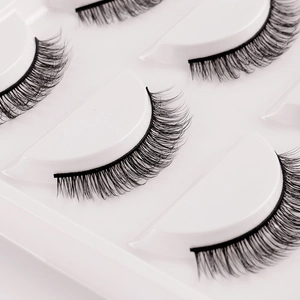 Five pairs of natural thick black synthetic eyelashes with a curled crisscross pattern