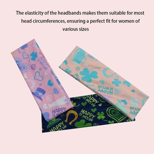 Three elastic St. Patrick's Day headbands with cartoon patterns in pink and navy