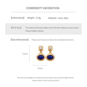 Detailed spec sheet showing vintage gold resin oval earrings with dimensions and weight