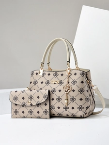 Beige tote bag and matching wallet set with monogram pattern and metal hardware
