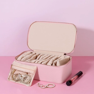 Pink travel jewelry organizer box with lychee grain PU leather and zip closure