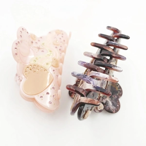 Acetate heart star studded hair claw clips set in pink and marble purple styles
