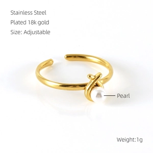 Detail of adjustable 18k gold plated stainless steel ring with a white pearl accent