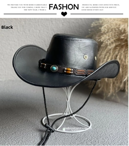 Detail of black cowboy hat with turquoise beads and adjustable chin strap