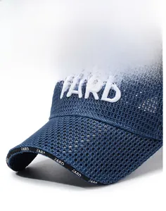 Detail of the navy blue mesh baseball cap featuring white FARD letter embroidery