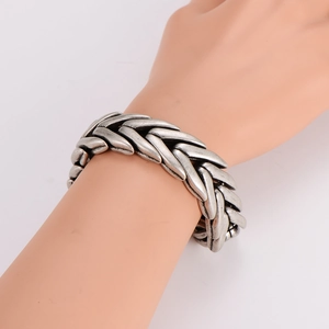 Rugged geometric stainless steel bracelet in antique silver finish on model arm