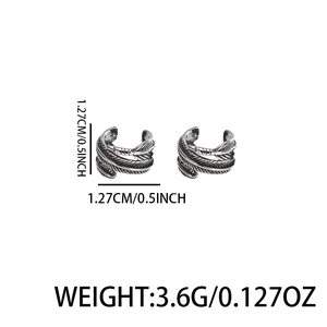 Minimalist feather-shaped clip-on earrings in vintage silver finish with textured engraving