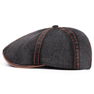 Vintage dark gray washed denim flat cap with brown leather brim and contrast stitching