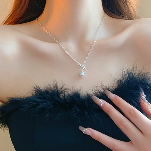 Minimalist S925 silver OT buckle necklace with geometric faux pearl pendant on a model