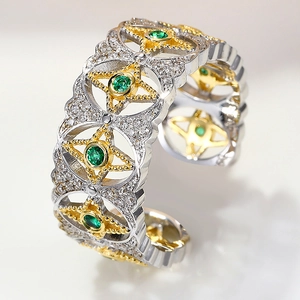 Vintage two-tone镂空 ring with green gemstone and white zircon starburst pattern