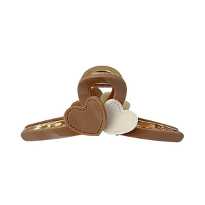 Elegant beige heart hair claw clip with brown accents for versatile styling
