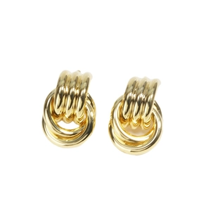 Minimalist gold multi-layered hoop earrings with a polished metallic finish on white background
