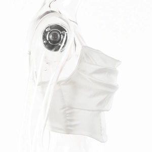 Detailed view of the white draped halter neck top featuring elegant pleated fabric texture
