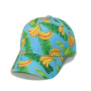 Blue baseball cap with banana leaf print and tropical summer beach style for women
