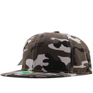 Detail of flat brim snapback hat featuring jungle camouflage pattern and original tags