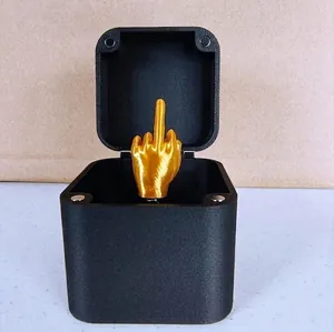 Funny Middle Finger in a Box creative prank gift with a golden gesture sculpture inside