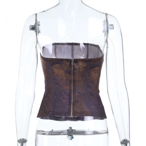 Detail view of the vintage print corset top featuring a metallic back zipper closure