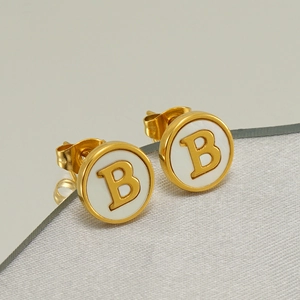 Minimalist gold stainless steel round stud earrings featuring a white letter B design