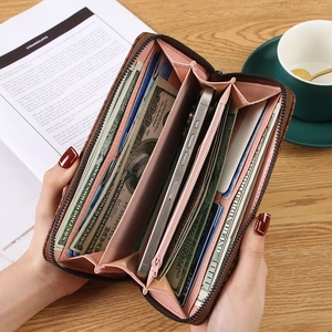 Brown long leather wallet for women with pink interior and high capacity card slots