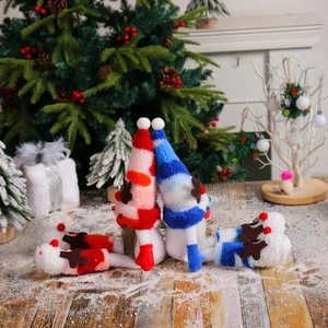 Christmas gnome plush dolls with antlers and long legs set on a festive winter background
