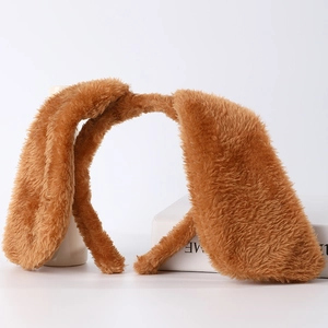 Brown plush dog ears headband for cosplay and performances on a white display stand