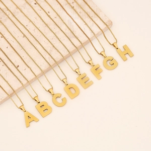 Golden stainless steel letter pendants A to H with textured finish on box chain