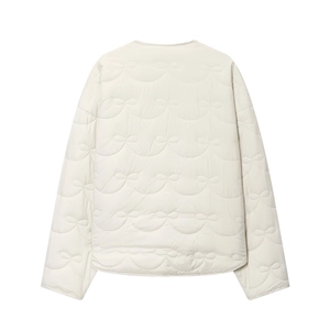 White quilted jacket for women featuring elegant bow pattern quilting and a clean back view